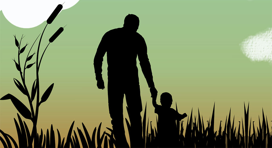 A sillhouette of a father and child outside